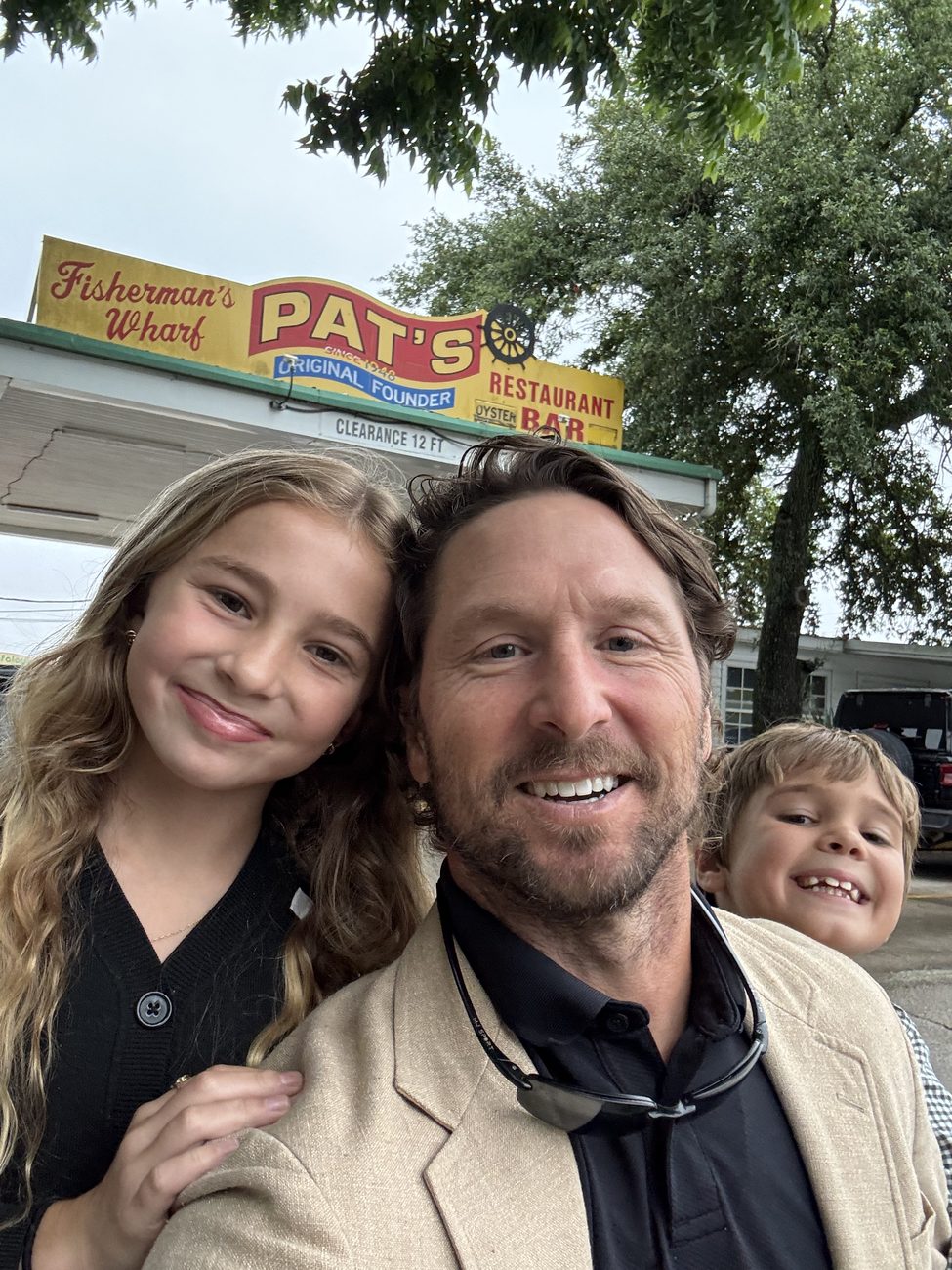 Coach Simoneaux with his children